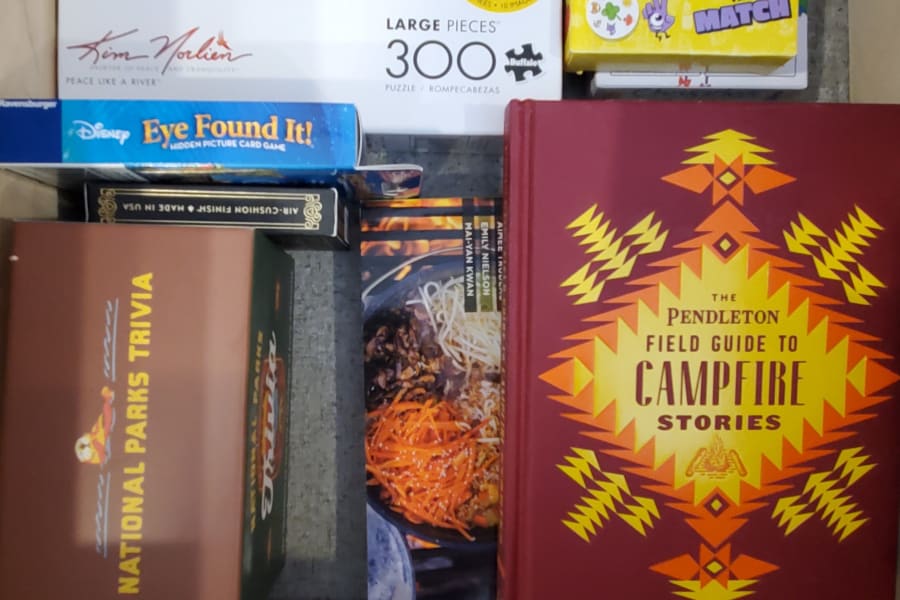 Essential entertainment for RV rental: puzzles, card games, trivia, and campfire stories. Compact fun for trips!