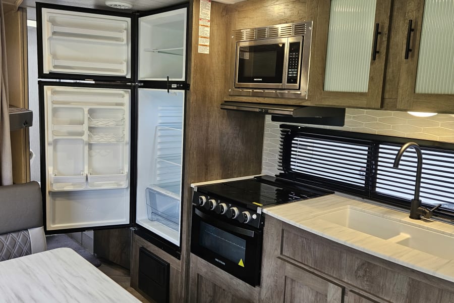 Great kitchen space stocked with everything you need to prepare meals.