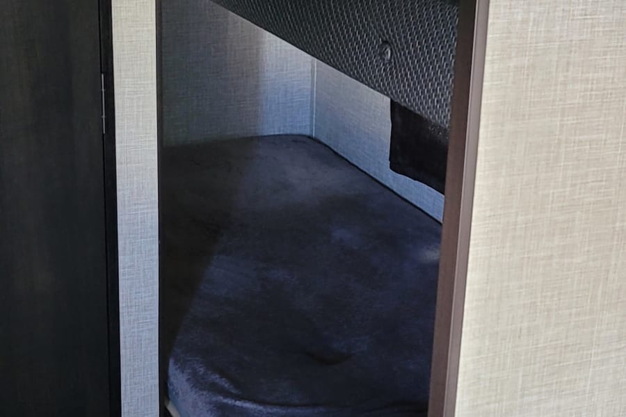 Bunk beds Pillows blanket sheet and Charging port