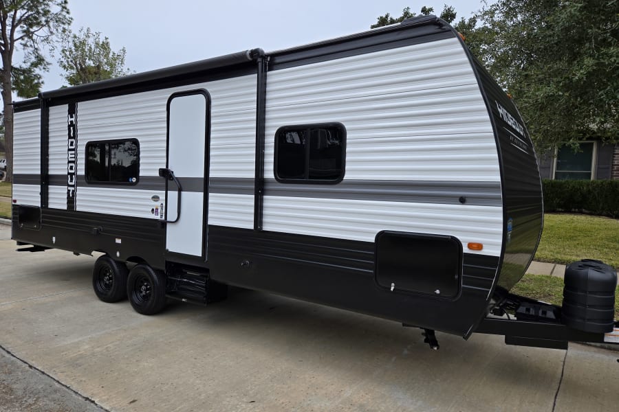 Exterior Passenger Side/Camp side of 2025 Keystone Hideout Sport 240BH