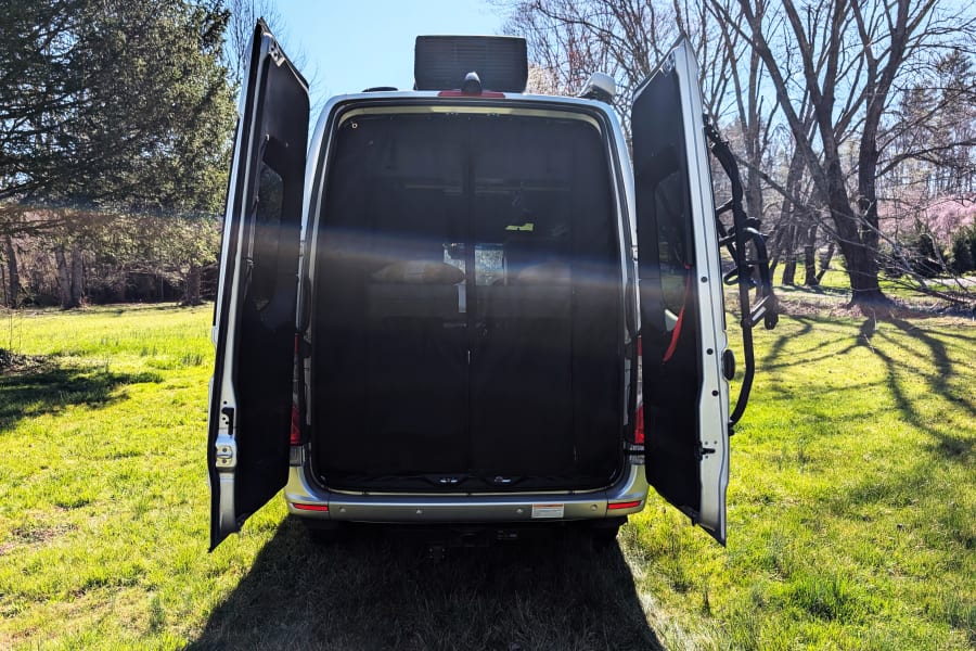 Large doors out back give access to the rear storage and the bed above. Plenty of room for all your gear.