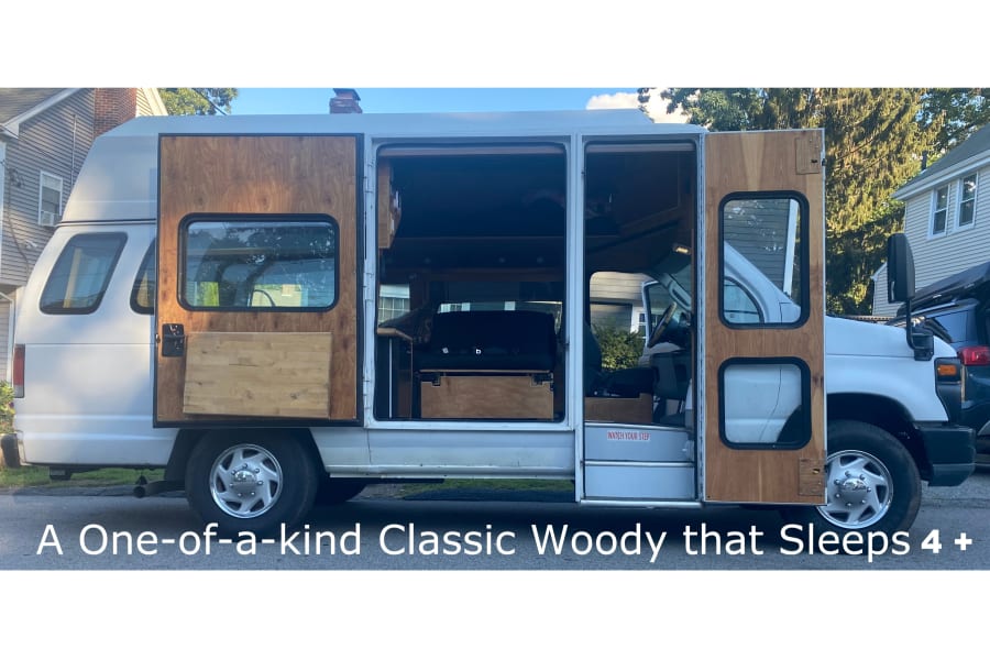 Experience this unique woody camper van for your next RV rental. Sleeps 4+ with custom wood panels and a welcoming interior.