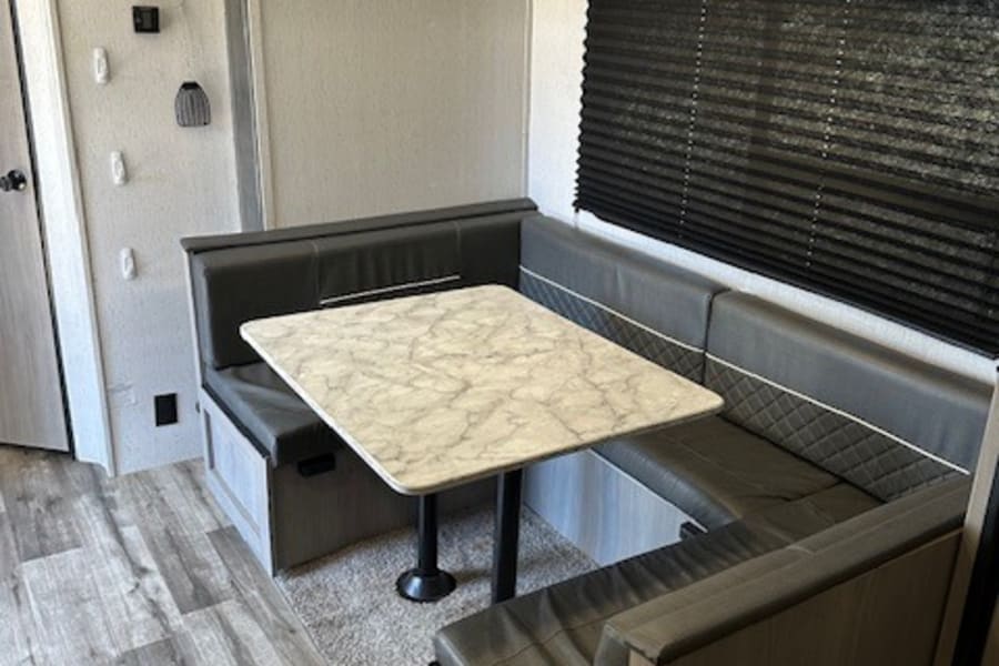 Dinette also converts to a bed for up to two people