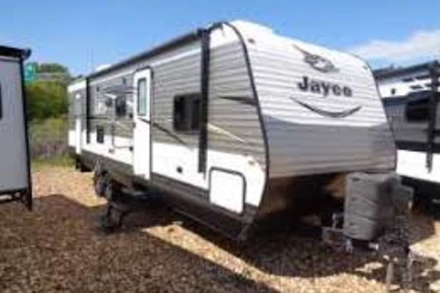 This modern Jayco travel trailer is ideal for an RV rental. Your comfortable mobile home for outdoor adventures awaits!