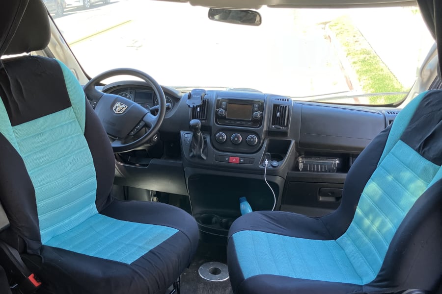 BOTH seats fully swivel so that you can set up the dining table or just have a place to sit and relax while you're parked and cooking or chilling in between destinations. 