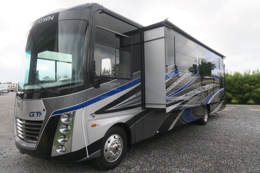 Modern Georgetown GT7 class A RV rental with slide-out extended, ready for your next adventure.
