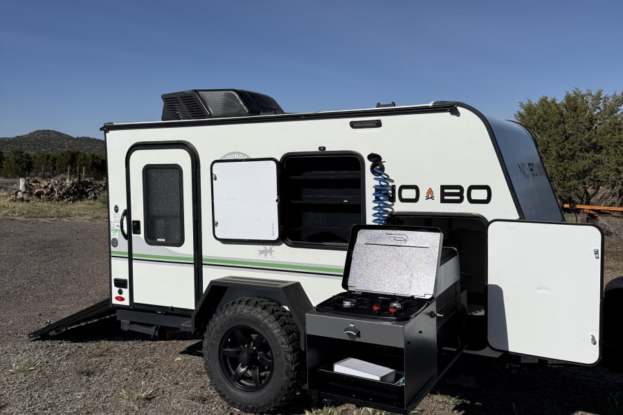 This compact off-road travel trailer with an outdoor kitchen is an ideal RV rental for your next adventure.