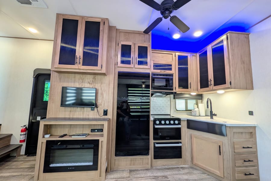 This impressive Cherokee Arctic Wolf 287BH Limited is spacious and loaded with comfortable features. Sleeps up to 10. Two bedrooms with separate bunkroom. Outdoor kitchen, solar and much more.