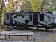 2023 Blackstone Titanium  by Outdoors RV for rent in 49686