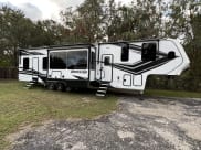2022 Grand Design Momentum Toy Hauler Fifth Wheel available for rent in Palmetto, Florida