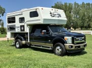 1998 Bigfoot 30-C10 Truck Camper available for rent in Windsor, Colorado