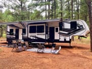 2022 Grand Design Momentum M-Class Toy Hauler Fifth Wheel available for rent in Phoenix, Arizona