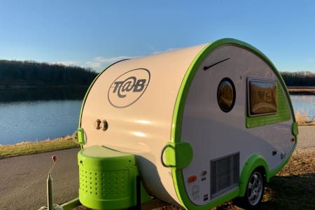 The Pea Pod: a 2008 T@b teardrop camper—queen bed & inside kitchen