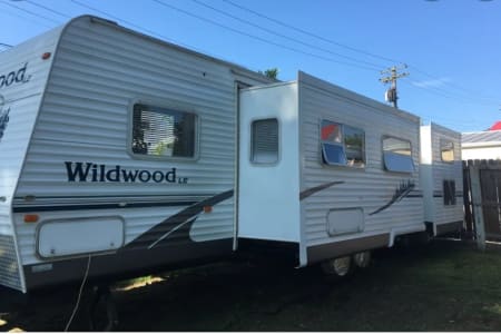 STATIONARY Wildwood trailer located in Pine Crest Lakeview campground