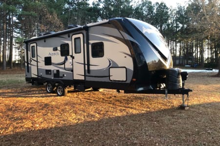 Go Camping in the Brown Hornet!  Bunk Beds, King Size Bed.