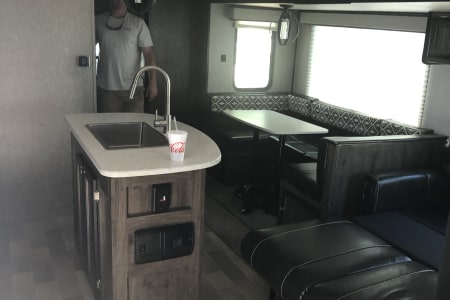 2019 Heartland RVs Mallard with 3 slides and island in kitchen .
