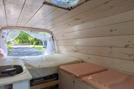 Cozy n cute 2014 Ford Econoline - sink, solar power, wood paneling