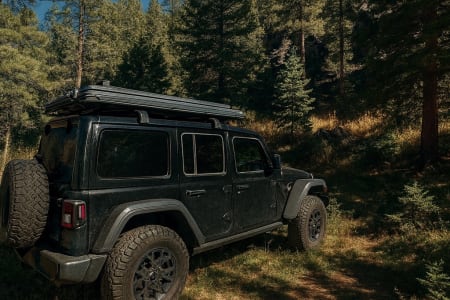 Lakewood CO 2025 Jeep wrangler 4xe with rooftop pop up tent