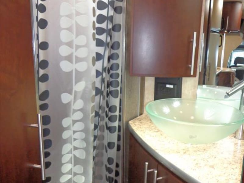 View of bathroom and shower area. 