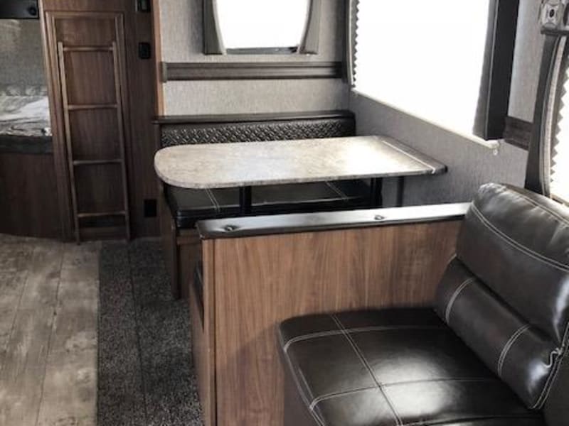 Slide out has table and couch