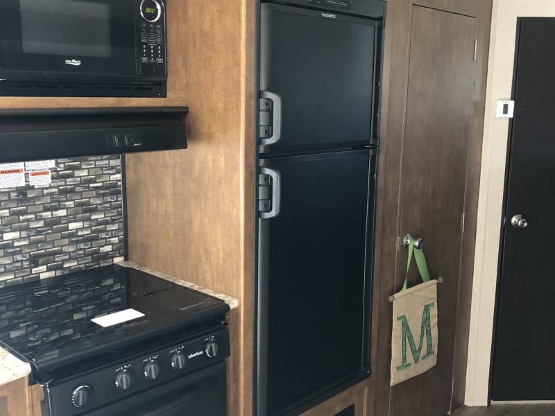 Very cold refrigerator and freezer that suns off of  propane and  electricity.