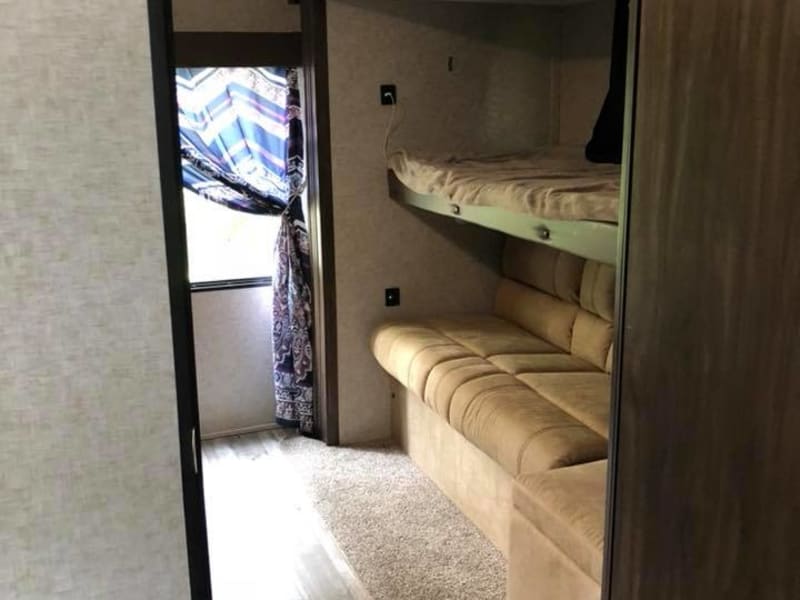 Bunkhouse has 3 bunks and a couch that can fold into another bed