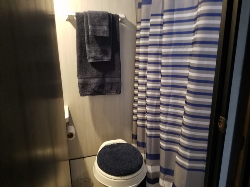 Full bath with skylight above shower.  Towels and wash cloths for 4 provided.  