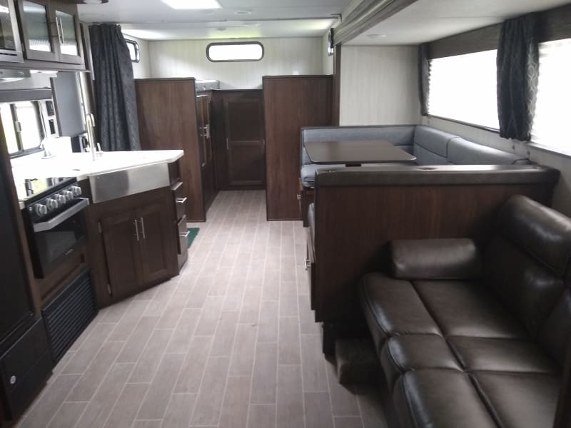 Open floor plan to bunkhouse allows for better cooling and gives more open feel to this coach. If more privacy is desired there are curtains you can close.