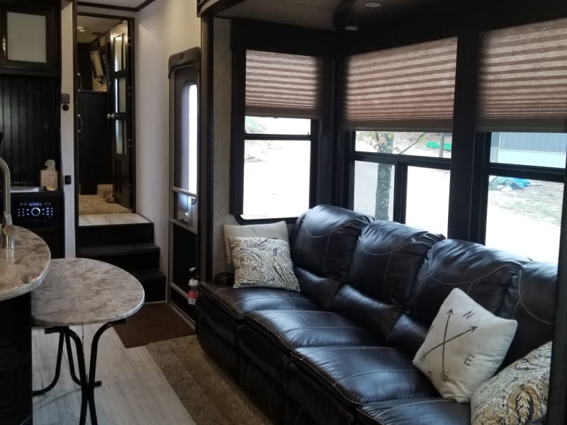 Comfy 4 person couch, all recline.