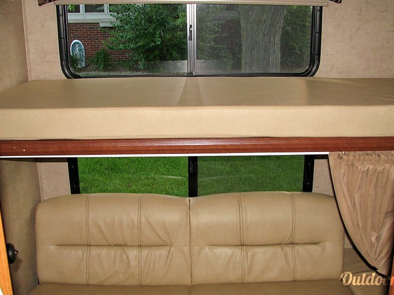 Rear Bunks, Foldout Couch (Double) and Single on top.