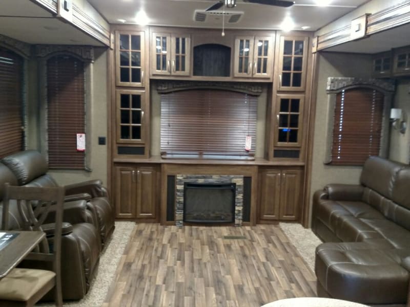 Living room with couch and recliners