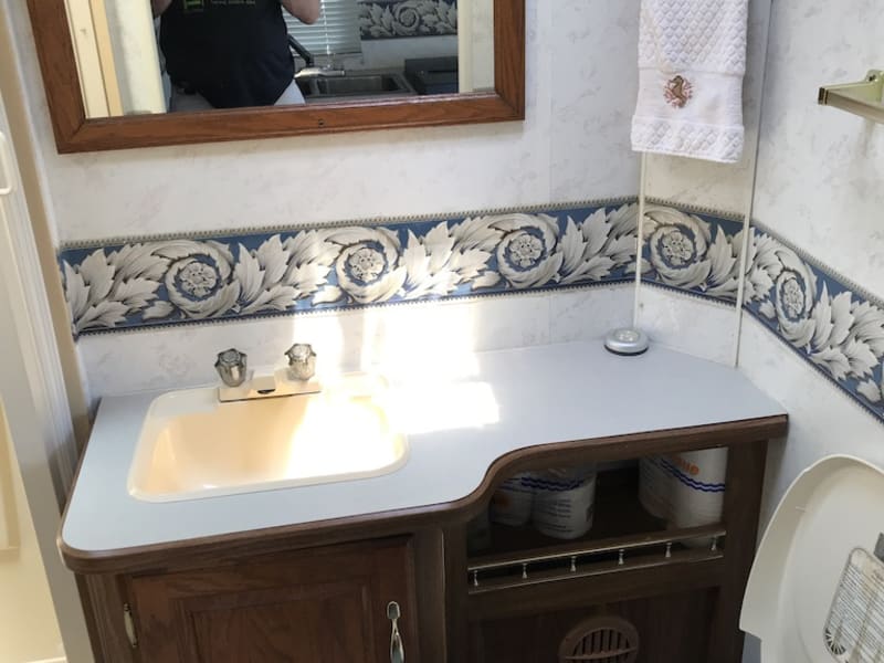 Toilet, sink and shower.