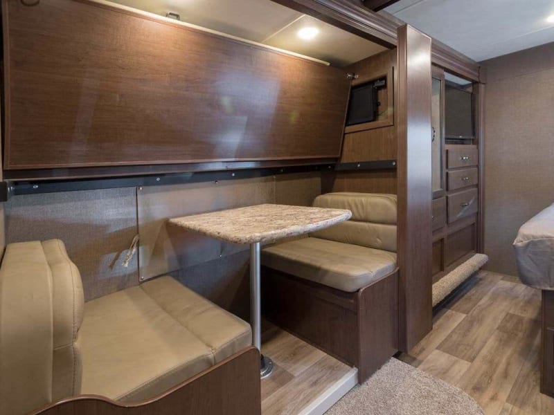 Kids table, with upper bunk flipped up.  The table lowers and becomes the bottom bunk bed.