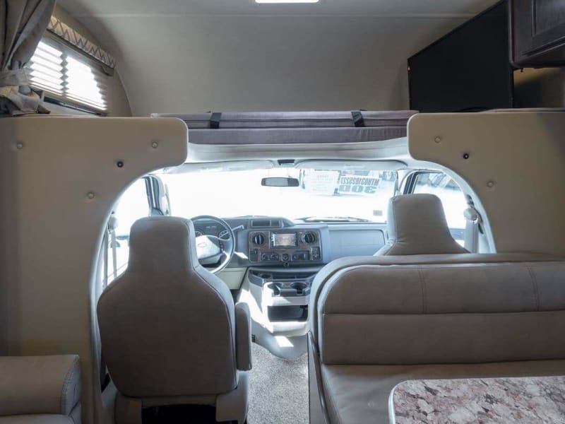 Driver's area with overhead bunk.