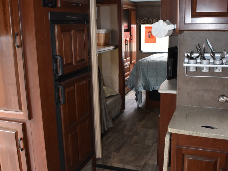 Looking from kitchen into hallway with bunks