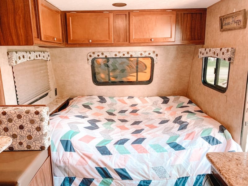 Queen bed and overhead storage