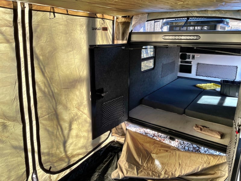 Optional Add a room tent with zippered access inside the trailer