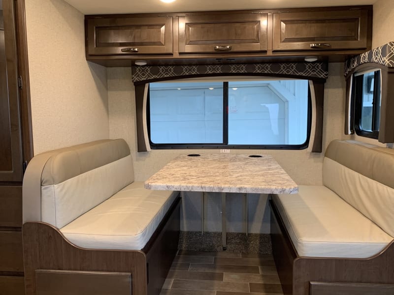 Dinette is spacious and can seat 4 adults or 6 children