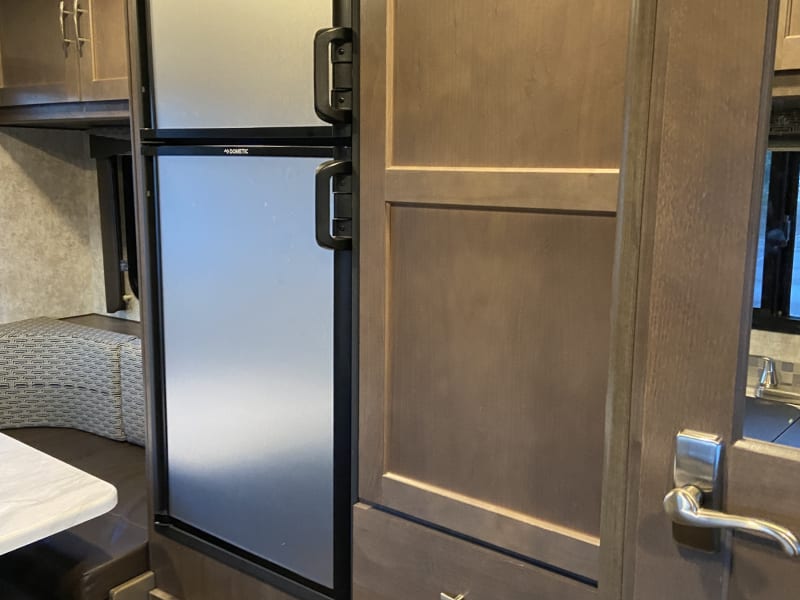 This closet is large and can handle many hanging clothes!