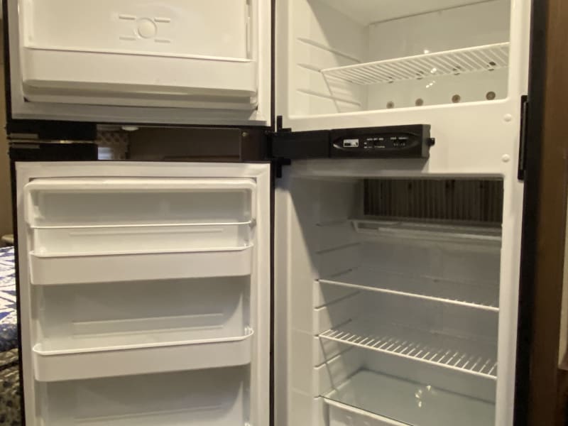 Full-sized fridge and freezer that runs off propane so it runs even if you aren't hooked up.