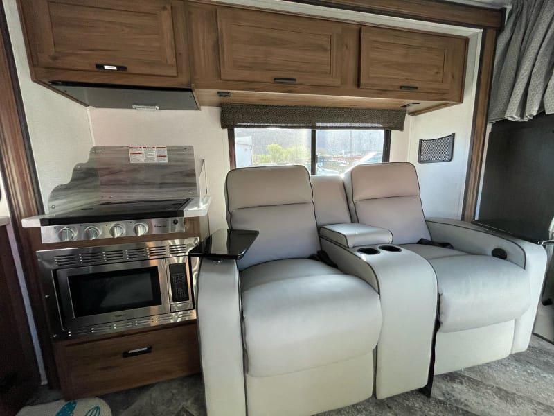 Your RV guests can travel in comfort with these two fully automatic recliners, with seatbelts and table trays