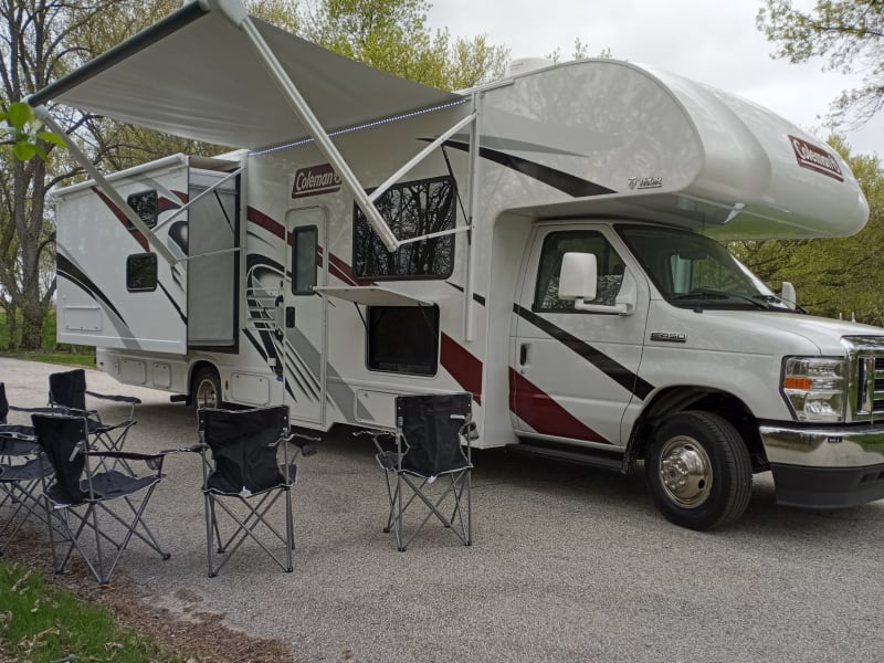 Lighted Awning, with folding chairs and outside TV 