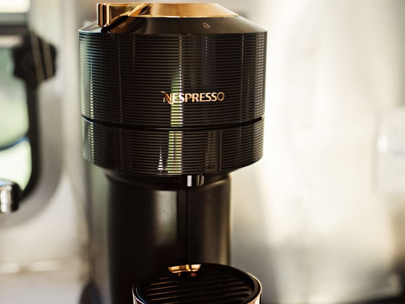 Enjoy espresso on the road with the Nespresso machine and included pods. You'll love our Yeti mugs!