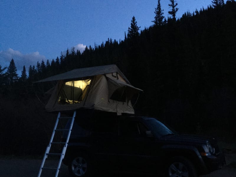 The tent includes LED strips with a battery pack. 