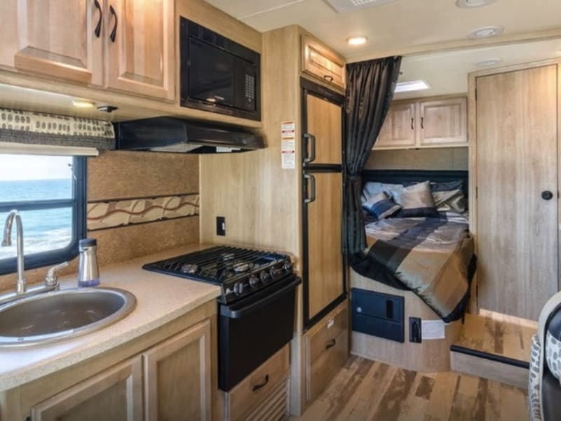 Large fridge, freezer, and clean, spacious kitchen area
