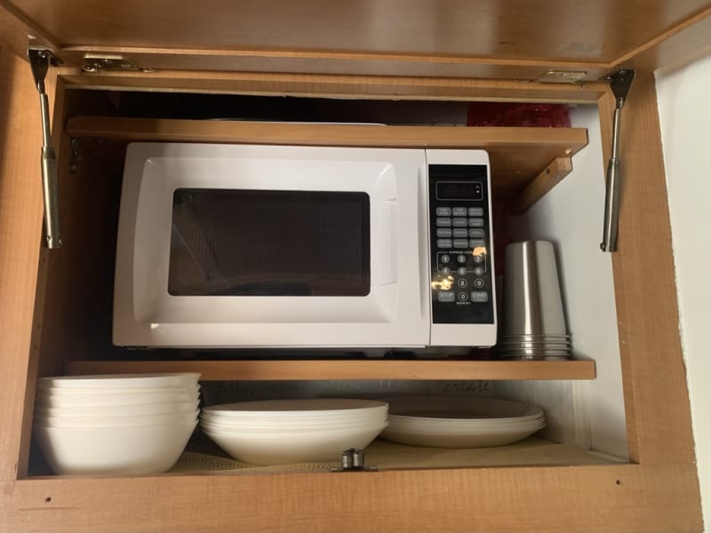 Hidden Microwave and dishes and cups for 6