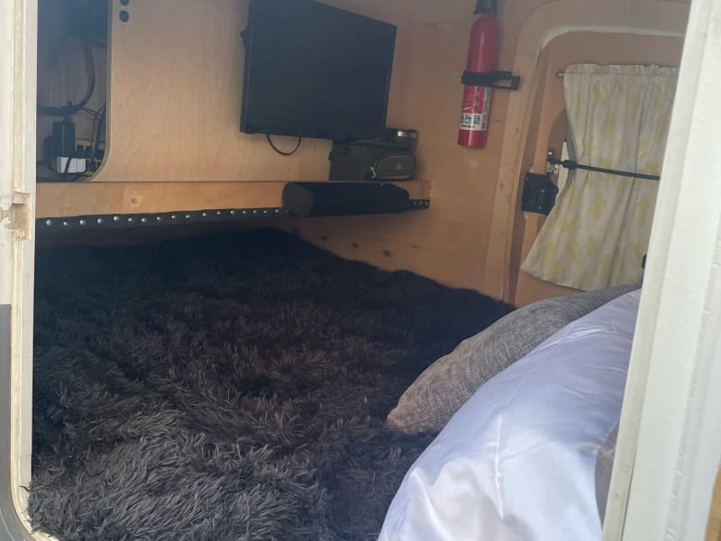 Super comfortable queen bed. Most guests say it's the coziest, softest RV bed they have been in! Surprisingly spacious inside for its size!