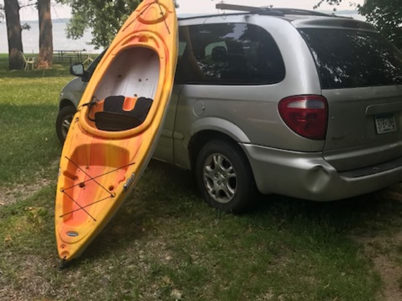 Low profile of the van allows easy loading of kayaks and without a top load the vehicle goes into parking where larger RVs can not go.