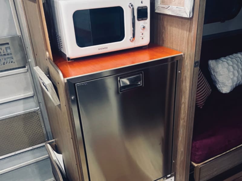 New marine 12v/120 stainless Vitrifrigo fridge. Great for boondocking or plug-in.