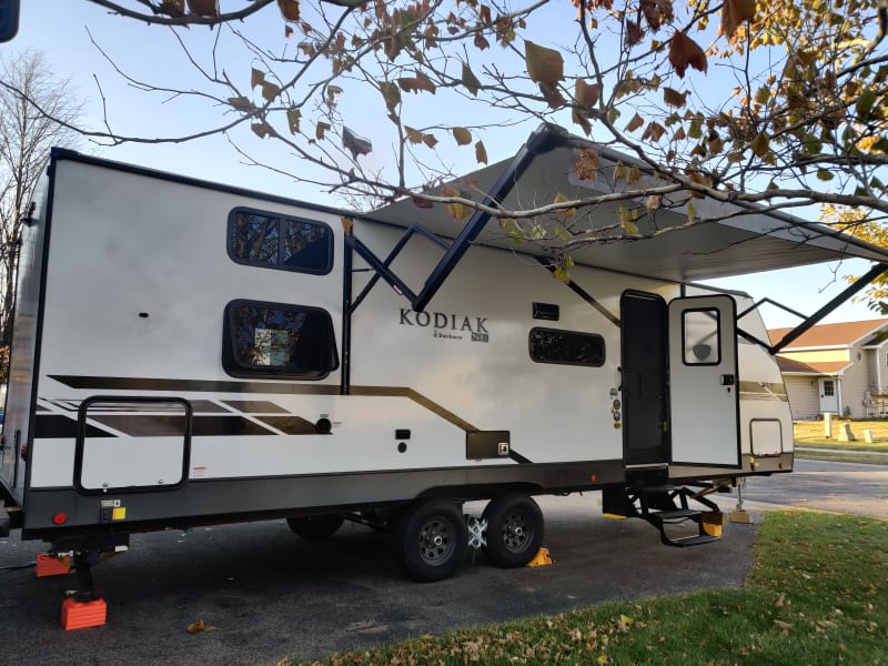 Exterior with awning extended.